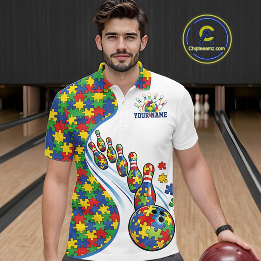 Male model in a bowling lane wearing a white polo shirt, front view featuring vibrant autism bowling strike design with puzzle details
