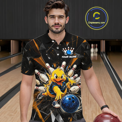 Male model wearing a custom black bowling polo shirt front view featuring a playful cartoon duck, bowling ball, bowling pins and orange cracked lightning pattern at the bowling alley