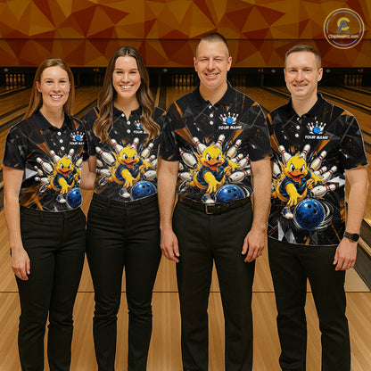 Group of four wearing custom black bowling shirts front view featuring playful cartoon duck artwork with bowling ball, bowling pins and orange cracked lightning pattern at the bowling alley