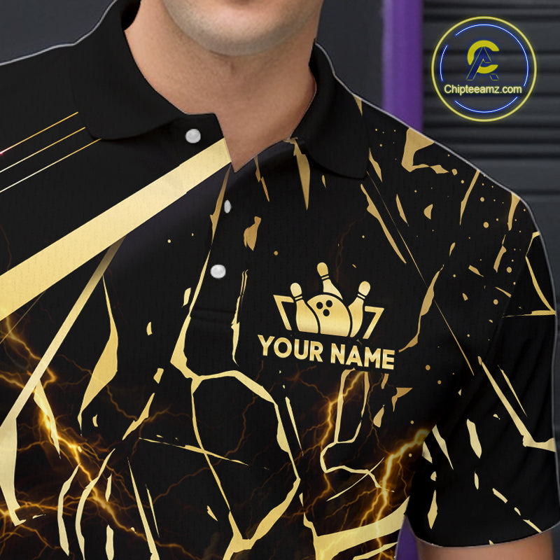 Close-up front view of a custom black gold bowling polo shirt showing the personalized player name, glowing bowling ball graphic and black gold marble crack design