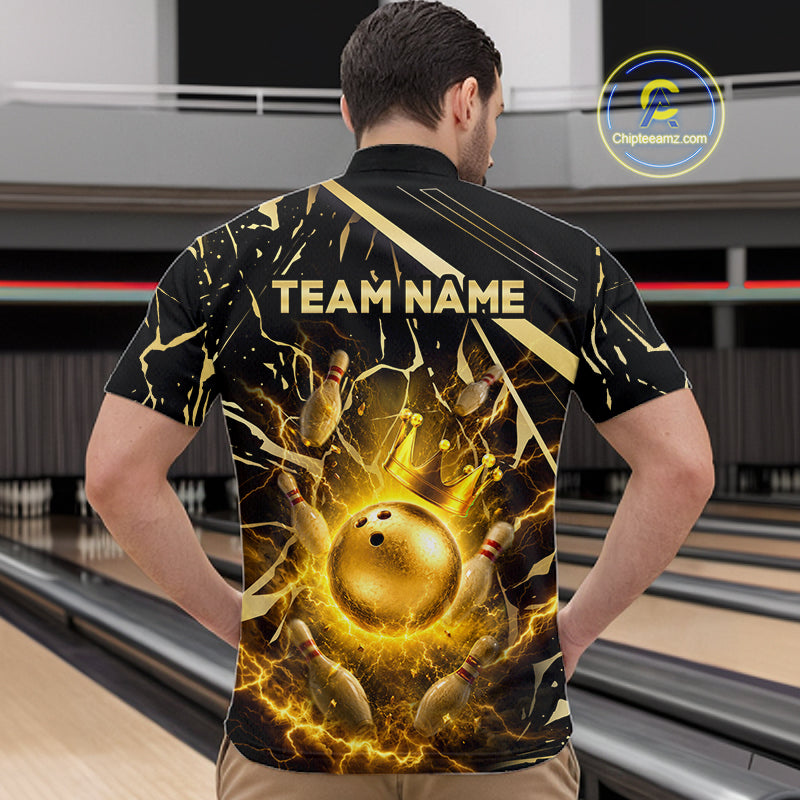 Male model wearing a custom black gold bowling quarter-zip shirt back view displaying the personalized team name above a glowing bowling ball with lightning energy artwork at the bowling alley