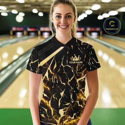 Female model wearing a custom black gold bowling quarter-zip shirt front view featuring a glowing bowling ball, lightning energy effect and black gold marble crack pattern at the bowling alley