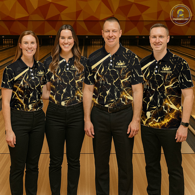 Group of four wearing custom black gold bowling shirts front view featuring glowing bowling ball artwork with lightning energy effect and black gold marble crack pattern at the bowling alley