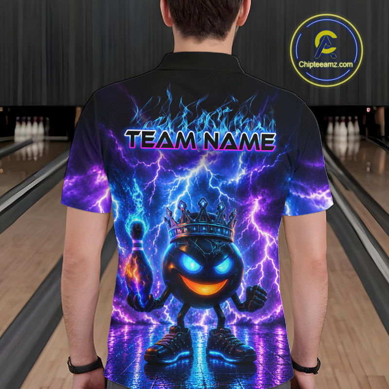 Person wearing a black bowling shirt with colorful design and 'TEAM NAME' text in a bowling alley.