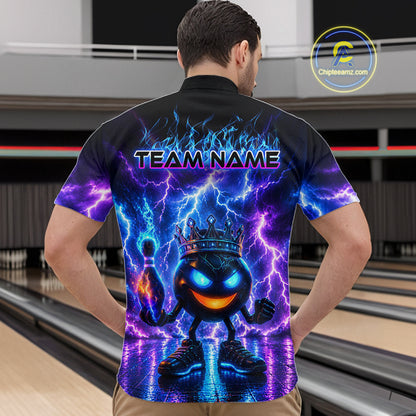 Person wearing a colorful bowling shirt with a design and 'TEAM NAME' text in a bowling alley.