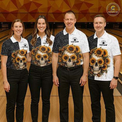Four people wearing matching shirts with skull and flower designs in a bowling alley.