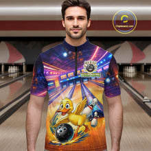 Load image into Gallery viewer, Man wearing a colorful bowling-themed shirt with a cartoon duck character in a bowling alley.