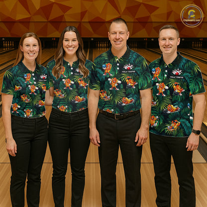 Four people wearing matching bowling shirts with a tropical design on a bowling alley.