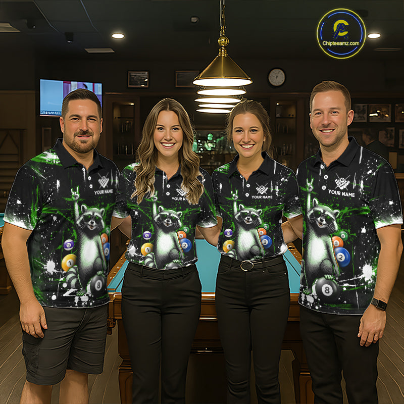 Four people wearing matching shirts with a raccoon and bowling ball design in a casual setting.