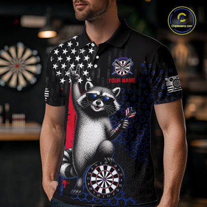 Man wearing a custom patriotic dart polo shirt featuring an American flag raccoon holding darts beside a dartboard in a professional dart room.