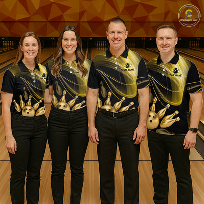 Four people wearing matching bowling shirts in a bowling alley.