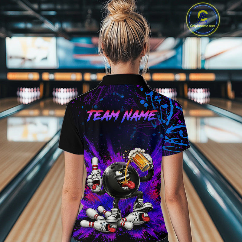 Person wearing a colorful bowling shirt with 'TEAM NAME' text in a bowling alley.