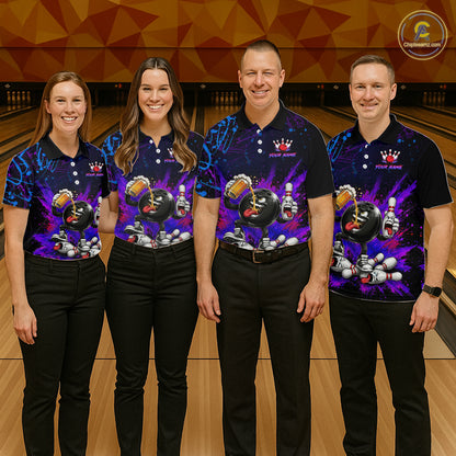 Four people wearing matching bowling team shirts in a bowling alley.