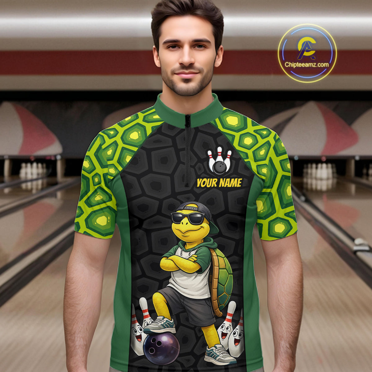 A man wearing custom green turtle bowling quarter-zip shirt front view featuring a cool cartoon mascot and bowling ball, displaying Your Name, at the bowling alley