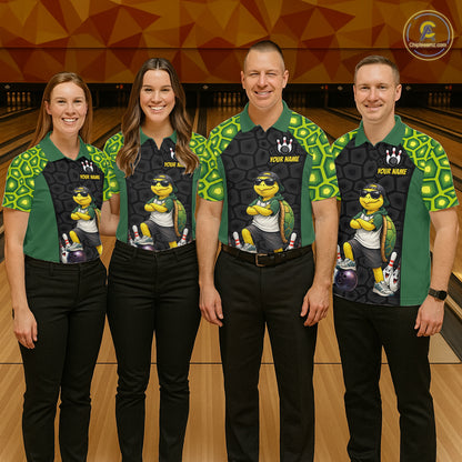Four people standing together in a bowling alley wearing matching custom bowling shirts with a green and black turtle graphic, black pants, and bowling-themed collars.