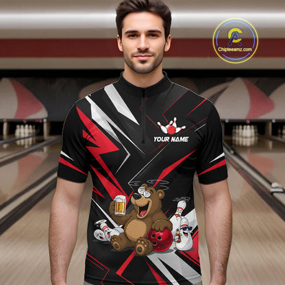 Man wearing a bowling jersey with a bear design in a bowling alley.