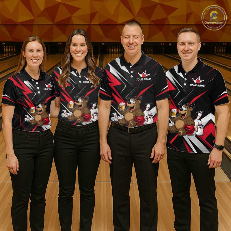 Four people wearing matching bowling shirts with a bear and beer design on a bowling alley.