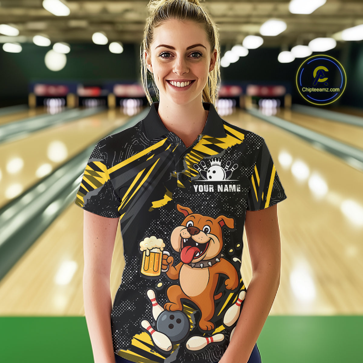 A woman wearing custom black yellow bulldog bowling polo shirt front view featuring a playful cartoon mascot, bowling ball and beer mug, displaying Your Name, at the bowling alley
