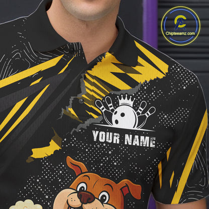 Close-up front view of custom black yellow bulldog bowling polo shirt showing Your Name, playful cartoon bulldog graphic and yellow paint splash pattern