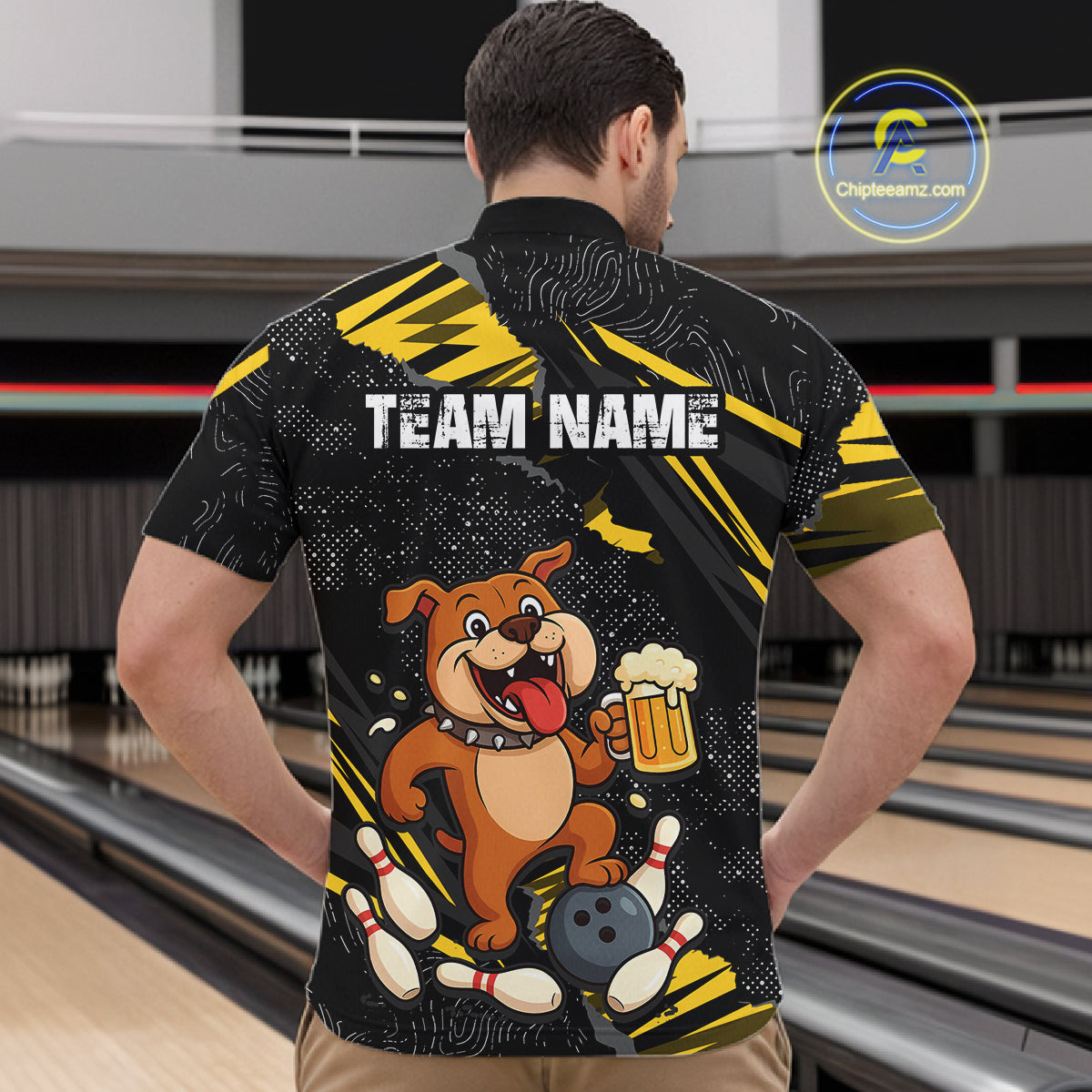 A man wearing custom black yellow bulldog bowling quarter-zip shirt back view featuring a playful cartoon mascot, bowling ball and beer mug, displaying Your Name, at the bowling alley