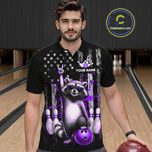 Load image into Gallery viewer, Man wearing a black shirt with a raccoon graphic holding a bowling ball on a bowling alley.