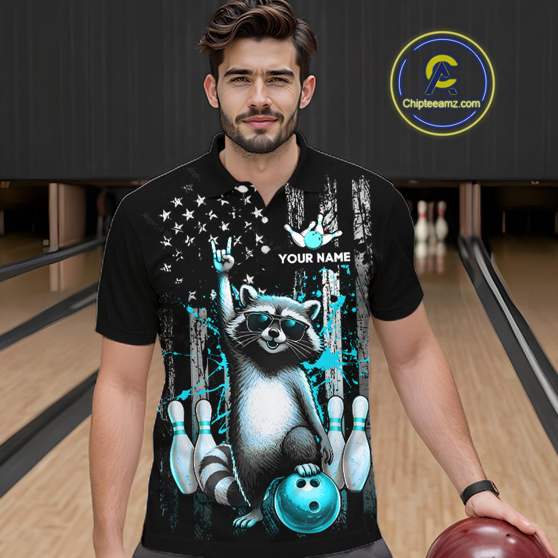 Man wearing a black shirt with a raccoon graphic in a bowling alley