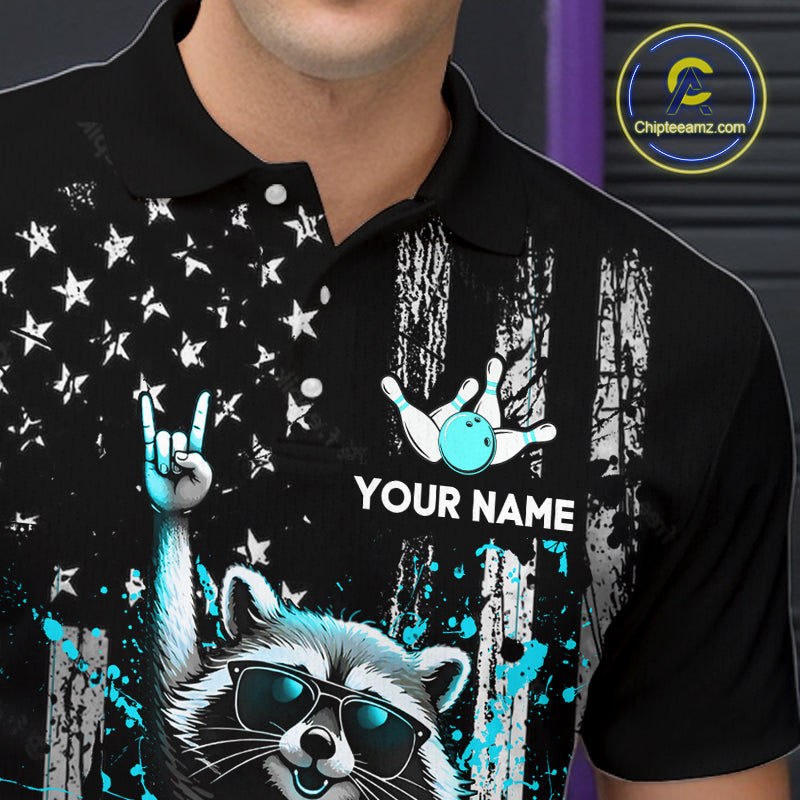 Black polo shirt with raccoon graphic and customizable text on a dark background
