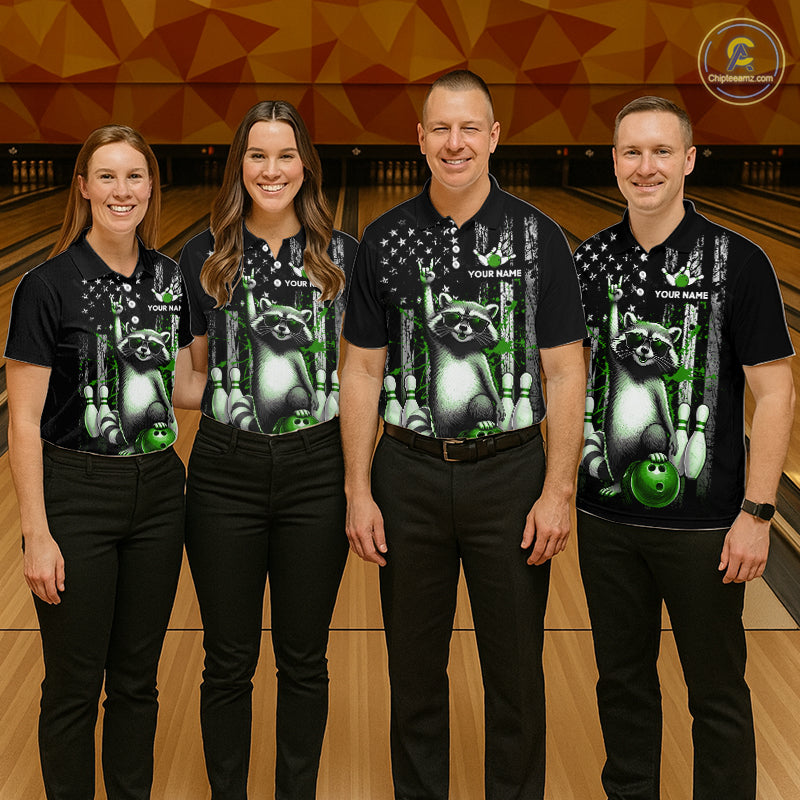 Four people wearing black shirts with raccoon and bowling design on a bowling alley background