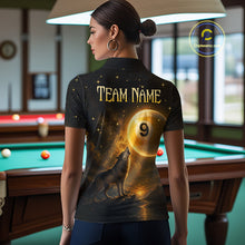 Load image into Gallery viewer, A woman stands in a billiards room wearing a custom black short-sleeve polo shirt from the back. The shirt features a detailed graphic print of a howling wolf under a full moon with the text 'TEAM NAME' and a customizable number '9'.