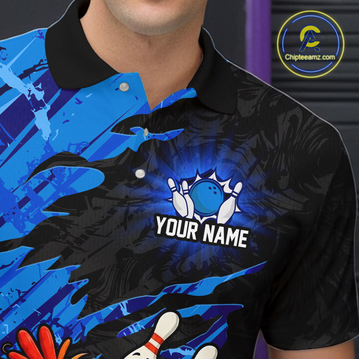Close-up collar and chest detail of custom funny chicken bowling polo shirt with personalized name and blue abstract pattern