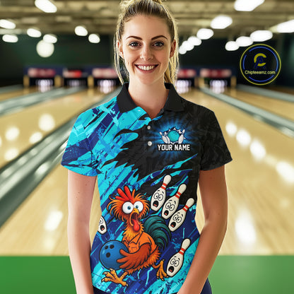 Female model wearing a custom cyan chicken bowling polo shirt front view featuring a colorful bowling mascot graphic, bowling pins, bowling ball and cyan abstract brush stroke pattern at the bowling alley