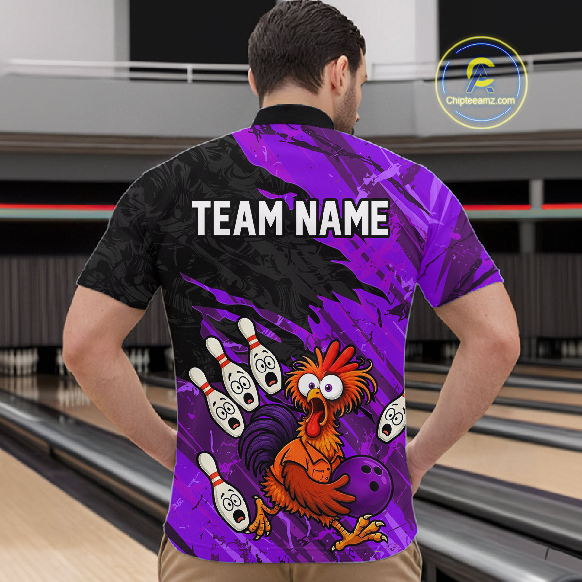 Male model wearing custom purple chicken bowling quarter-zip shirt back view with personalized bowling team name at bowling alley