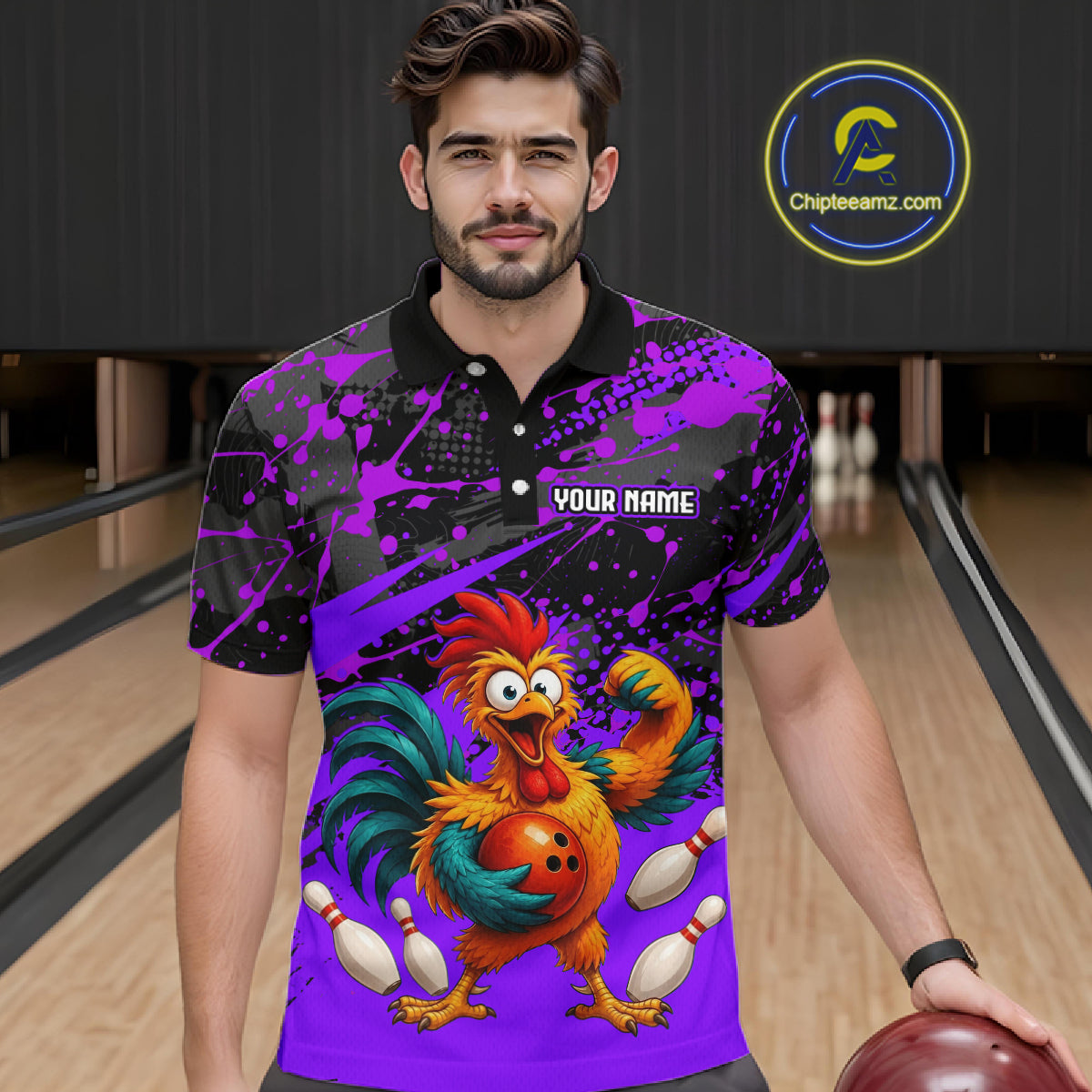 Male model wearing a custom purple rooster bowling polo shirt front view featuring a fierce cartoon rooster, bowling ball, bowling pins and purple black paint splash pattern at the bowling alley