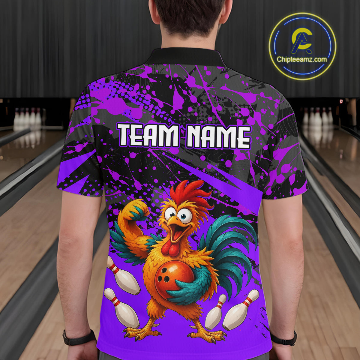 Male model wearing a custom purple rooster bowling polo shirt back view displaying the personalized team name above a fierce cartoon rooster graphic at the bowling alley