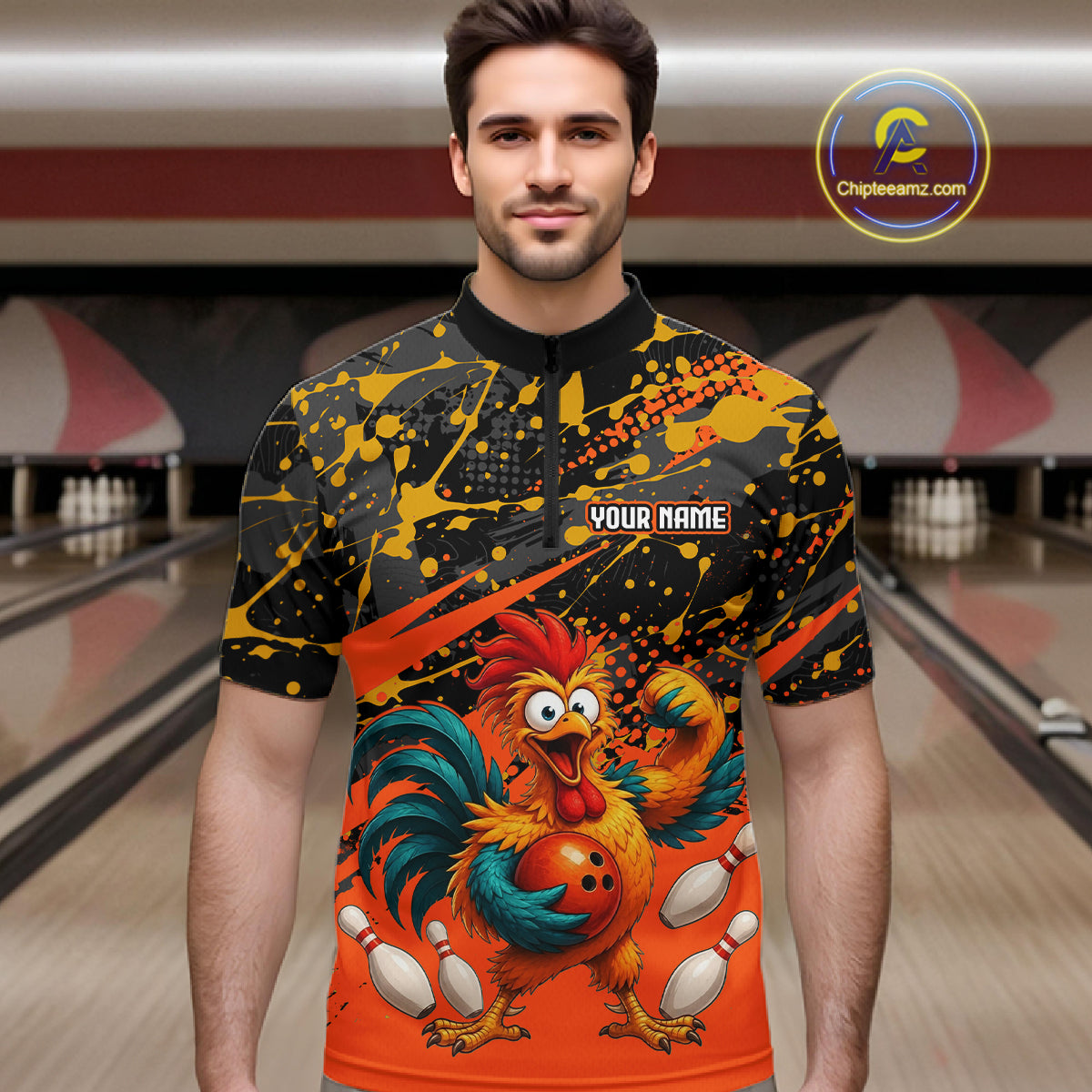 Male model wearing a custom orange rooster bowling quarter-zip shirt front view featuring a fierce cartoon rooster, bowling ball, bowling pins and black orange paint splatter pattern at the bowling alley