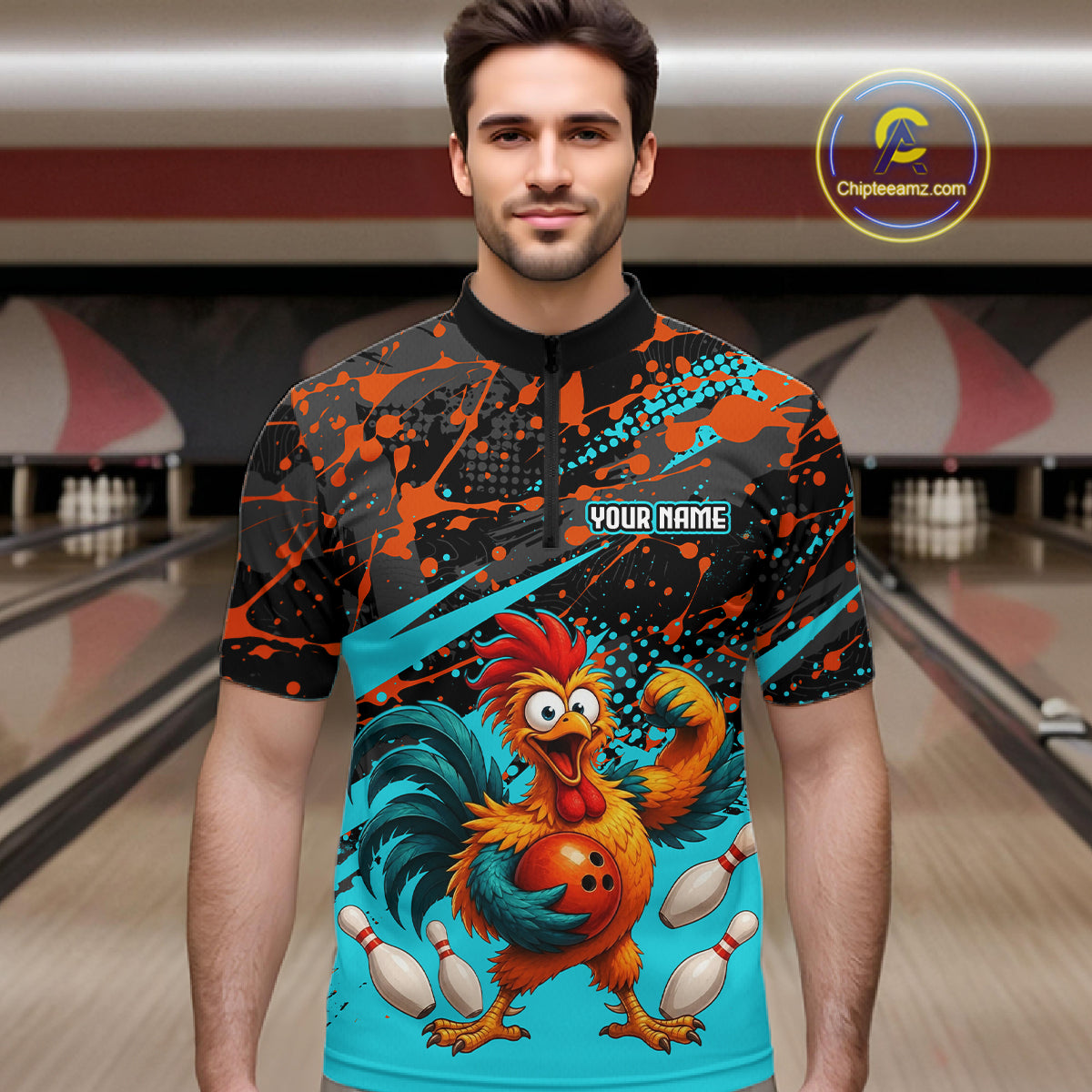 Male model wearing a custom black turquoise rooster bowling quarter-zip shirt front view featuring a fierce cartoon rooster, bowling ball, bowling pins and turquoise orange paint splash pattern at the bowling alley