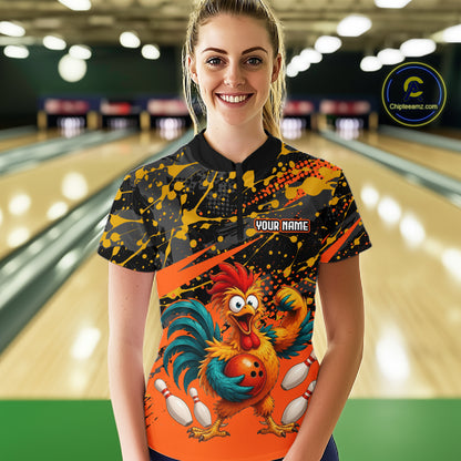 Male model wearing a custom orange rooster bowling quarter-zip shirt front view featuring a fierce cartoon rooster, bowling ball, bowling pins and black yellow paint splatter pattern at the bowling alley