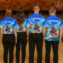 Load image into Gallery viewer, Four people wearing matching blue shirts with a bear graphic and 'Team Name' text in a bowling alley.