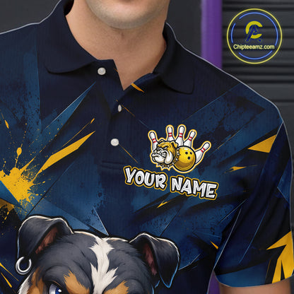 Close-up front view of a custom blue bulldog bowling polo shirt showing the personalized player name, fierce cartoon bulldog graphic and gold lightning accent design