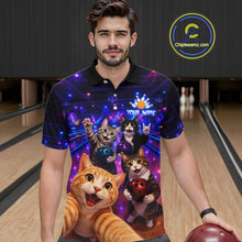 Load image into Gallery viewer, Man wearing a colorful polo shirt with cartoon cats and bowling elements in a bowling alley.