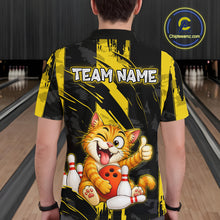 Load image into Gallery viewer, Male model wearing a custom black yellow cat bowling polo shirt back view displaying the personalized team name above a playful cartoon cat graphic at the bowling alley