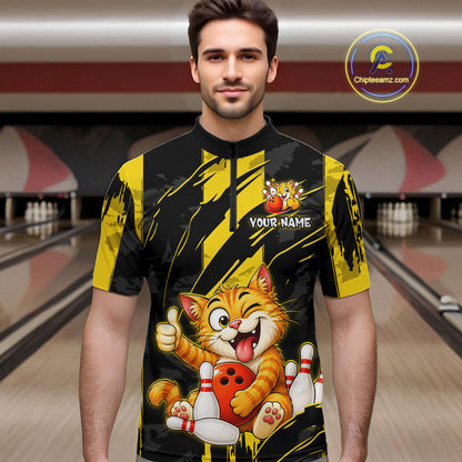 Male model wearing a custom black yellow cat bowling quarter-zip shirt front view featuring a playful cartoon cat, bowling ball, bowling pins and yellow black paint stroke pattern at the bowling alley
