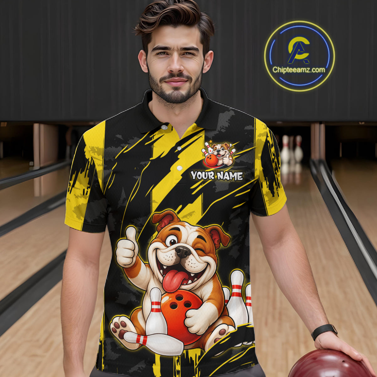 Male model wearing a custom black yellow bulldog bowling polo shirt front view featuring a playful cartoon bulldog, bowling ball, bowling pins and yellow black paint stroke pattern at the bowling all