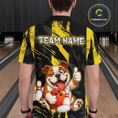 Male model wearing a custom black yellow bulldog bowling polo shirt back view displaying the personalized team name above a playful cartoon bulldog graphic at the bowling alley