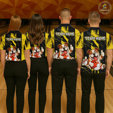 Load image into Gallery viewer, Group of four wearing custom black yellow bulldog bowling shirts back view displaying personalized team names above playful cartoon bulldog artwork on a yellow black paint stroke background at the bowling alley
