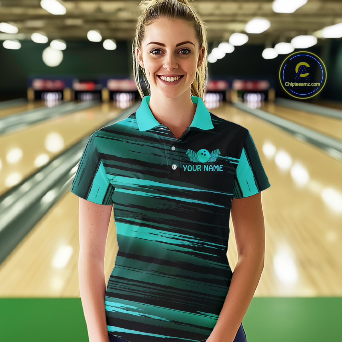 Female model wearing a custom black turquoise bowling polo shirt front view featuring a turquoise bowling ball emblem, dynamic turquoise brush stroke pattern and striped design at the bowling alley
