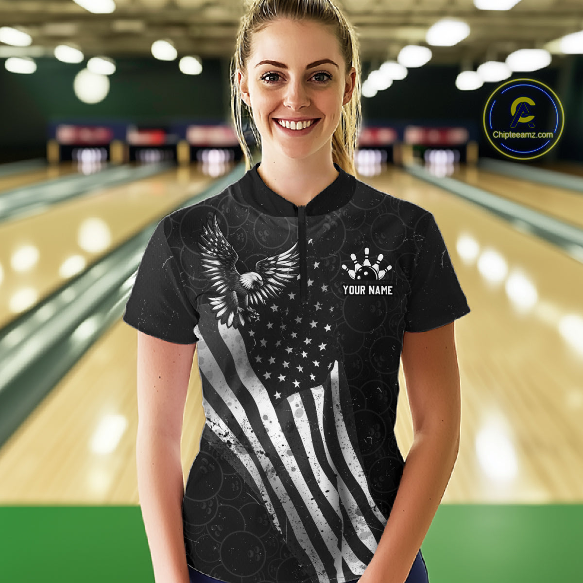 Male model wearing a custom black patriotic bowling quarter-zip shirt front view featuring a distressed American flag, bald eagle emblem and grunge pattern at the bowling alley