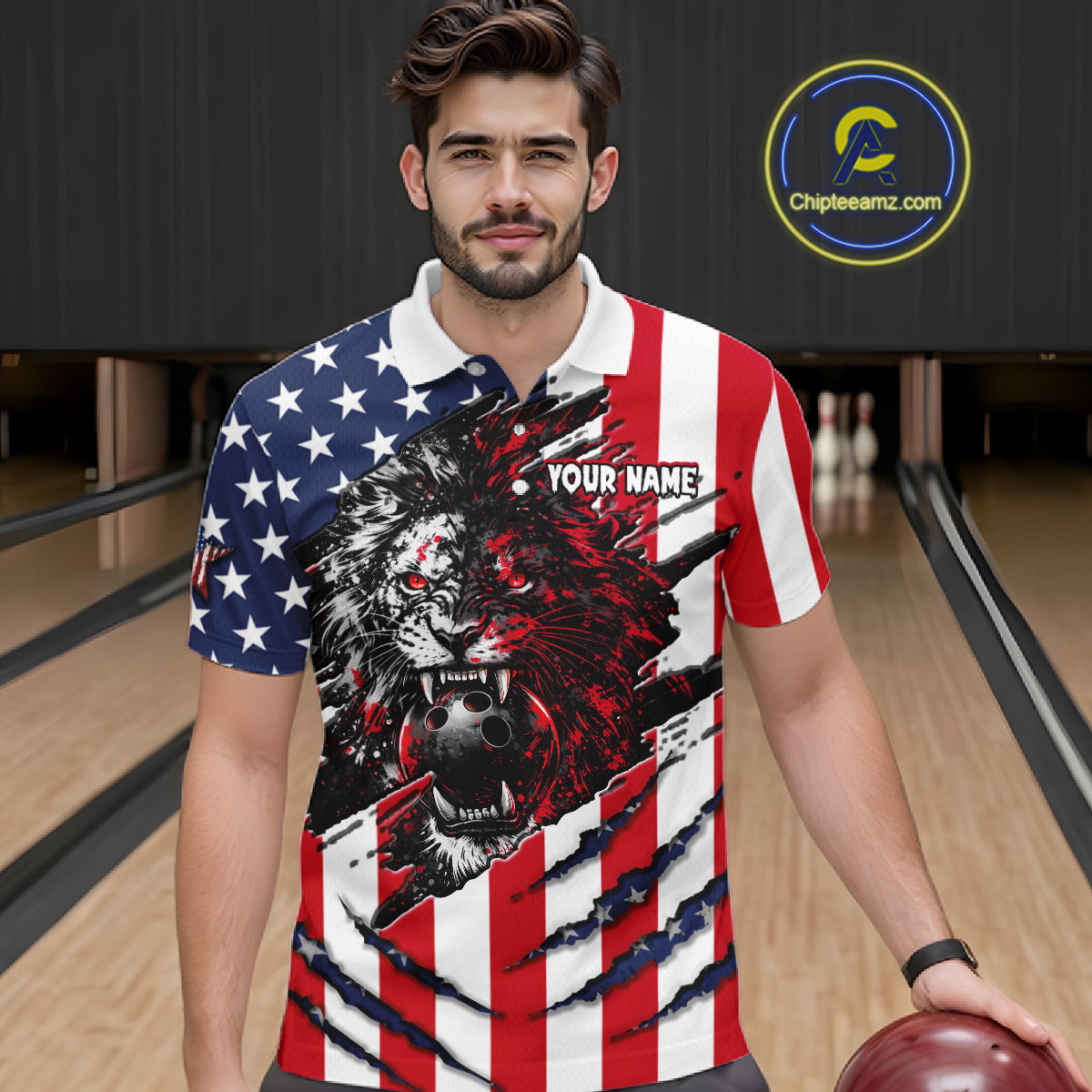 Man wearing a polo shirt with a lion design and American flag pattern in a bowling alley.