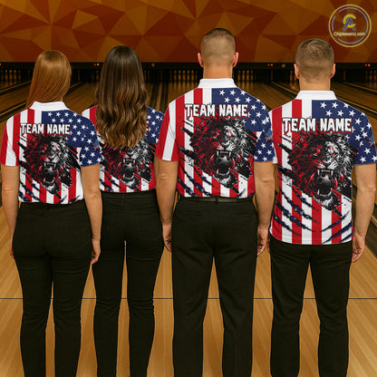 Four people wearing matching American flag-themed shirts with a lion graphic on a bowling alley.