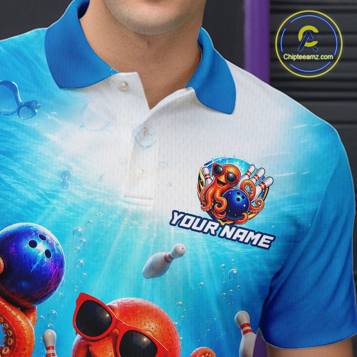 Blue and white polo shirt with colorful design and 'Your Name' text on a person wearing it.